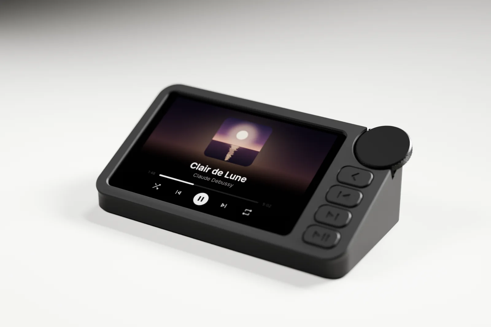 Object3, a small matte black wedge with a lit screen, a knurled wheel and four buttons